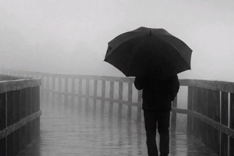 barish shayari in english with image romantic rain couple walking in monsoon